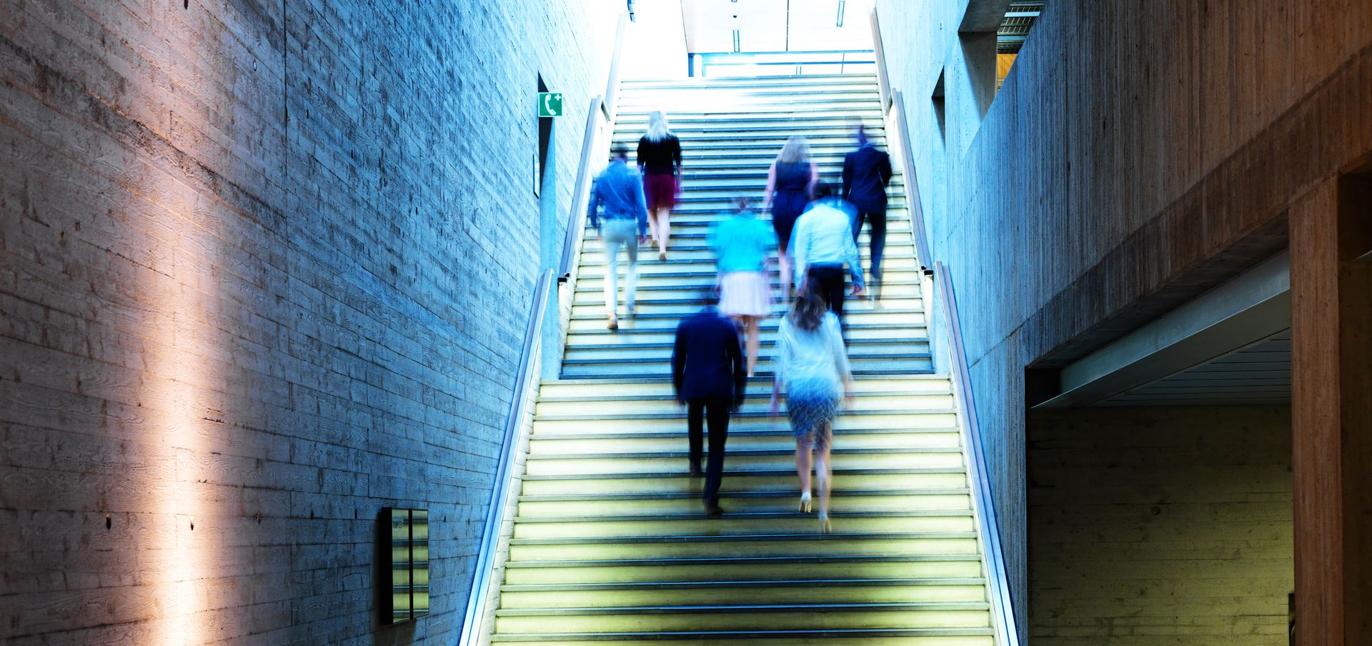 TRUMPF employees walking upstairs