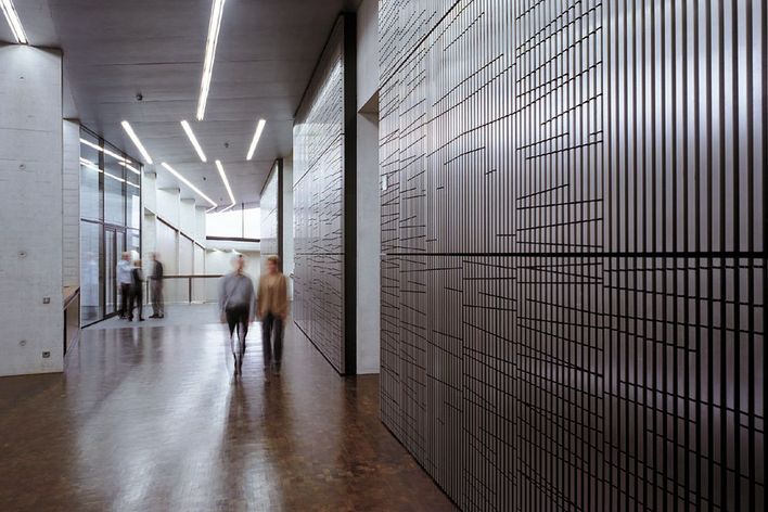 TRUMPF employees walking in a building in Ditzingen Germany