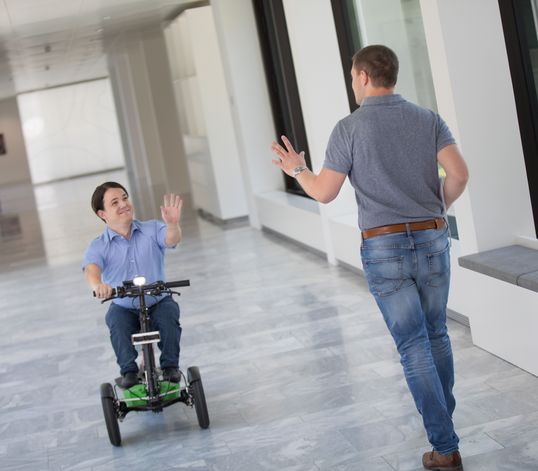 Employee with additional needs on a Segway