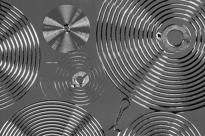 historical picture showing watch springs processed with laser technology