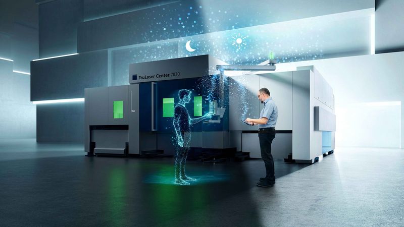 Bediener und Avatar stehen vor einer TruLaser Center 7040