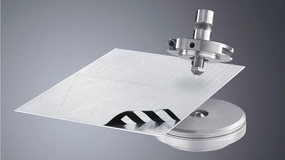 Film slitting tool with sample sheet
