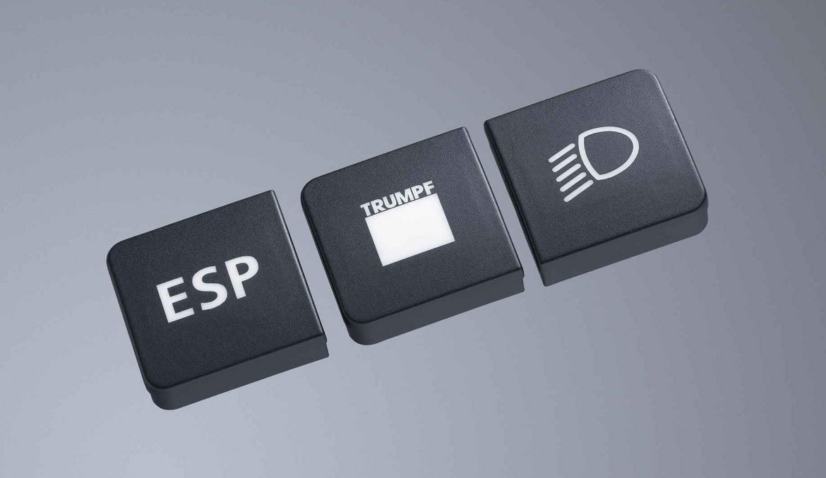 Daytime and night-time design of buttons in a vehicle as a result of laser marking with TRUMPF TruMark products
