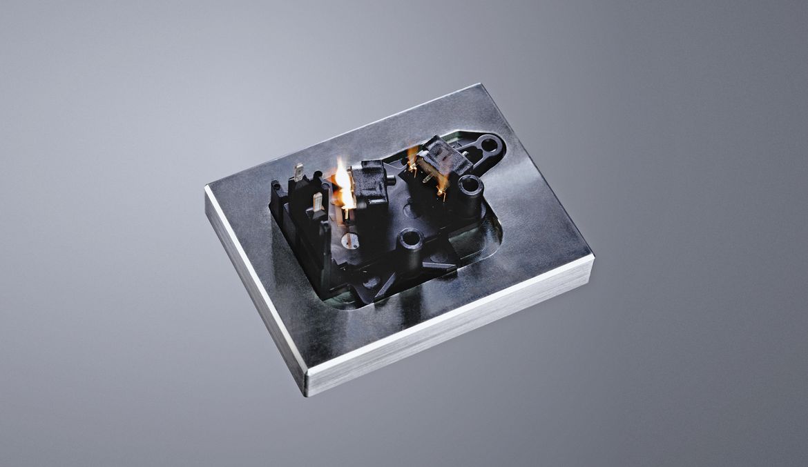 Laser welding a plug in burst mode